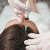 asian-masseuse-massaging-face-of-client2